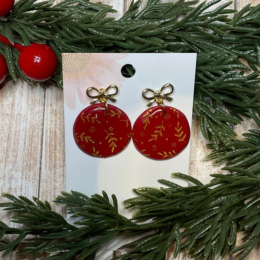 Silkscreened bauble dangle earrings with golden bow stud